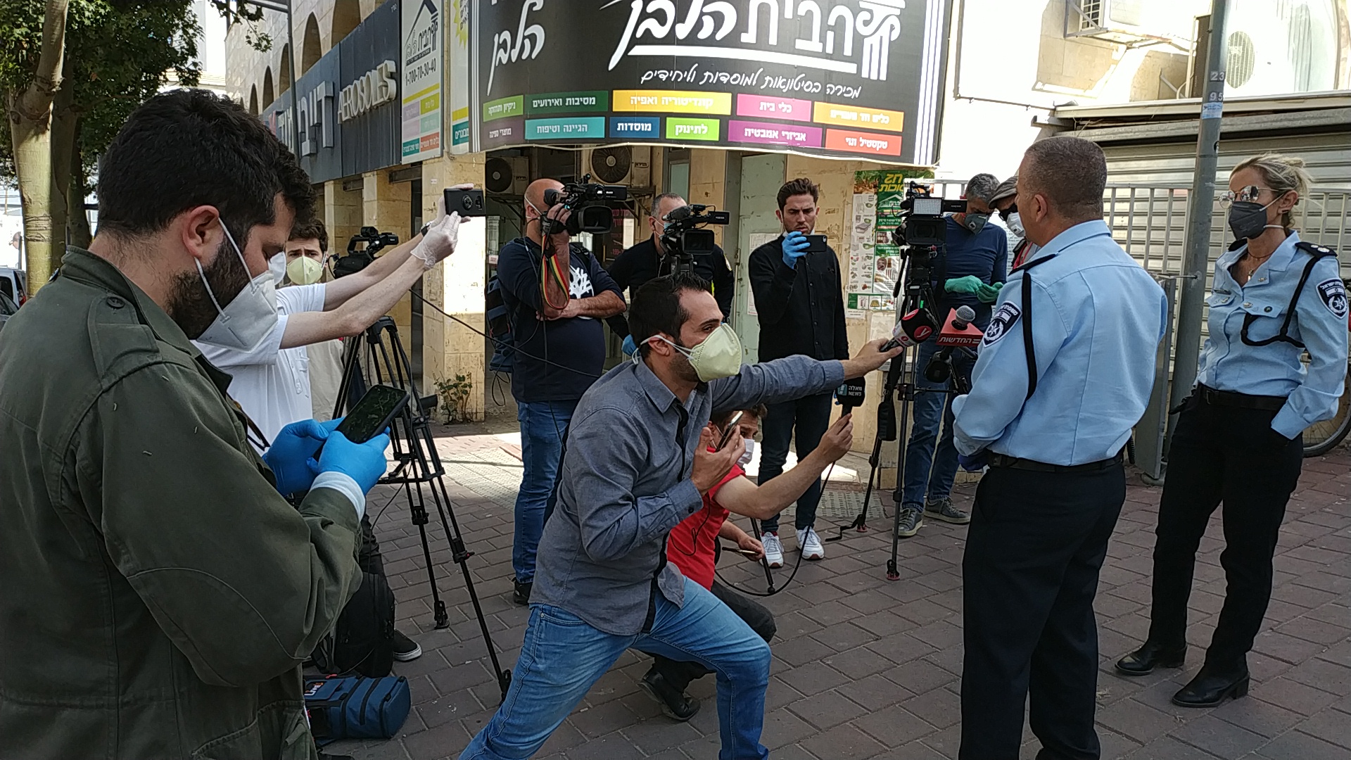 אילוסטרציה: תדרוך של המשטרה לעיתונאים לגבי הקורונה
